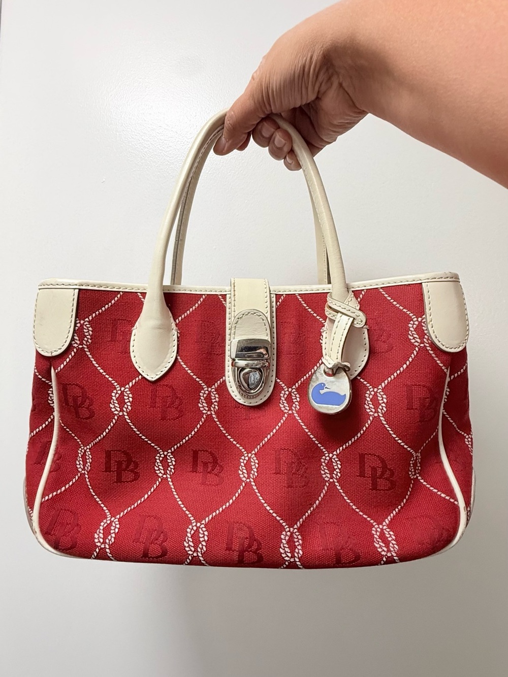 Dooney & Bourke Red Satchel with Cream Trim and Logo Pattern